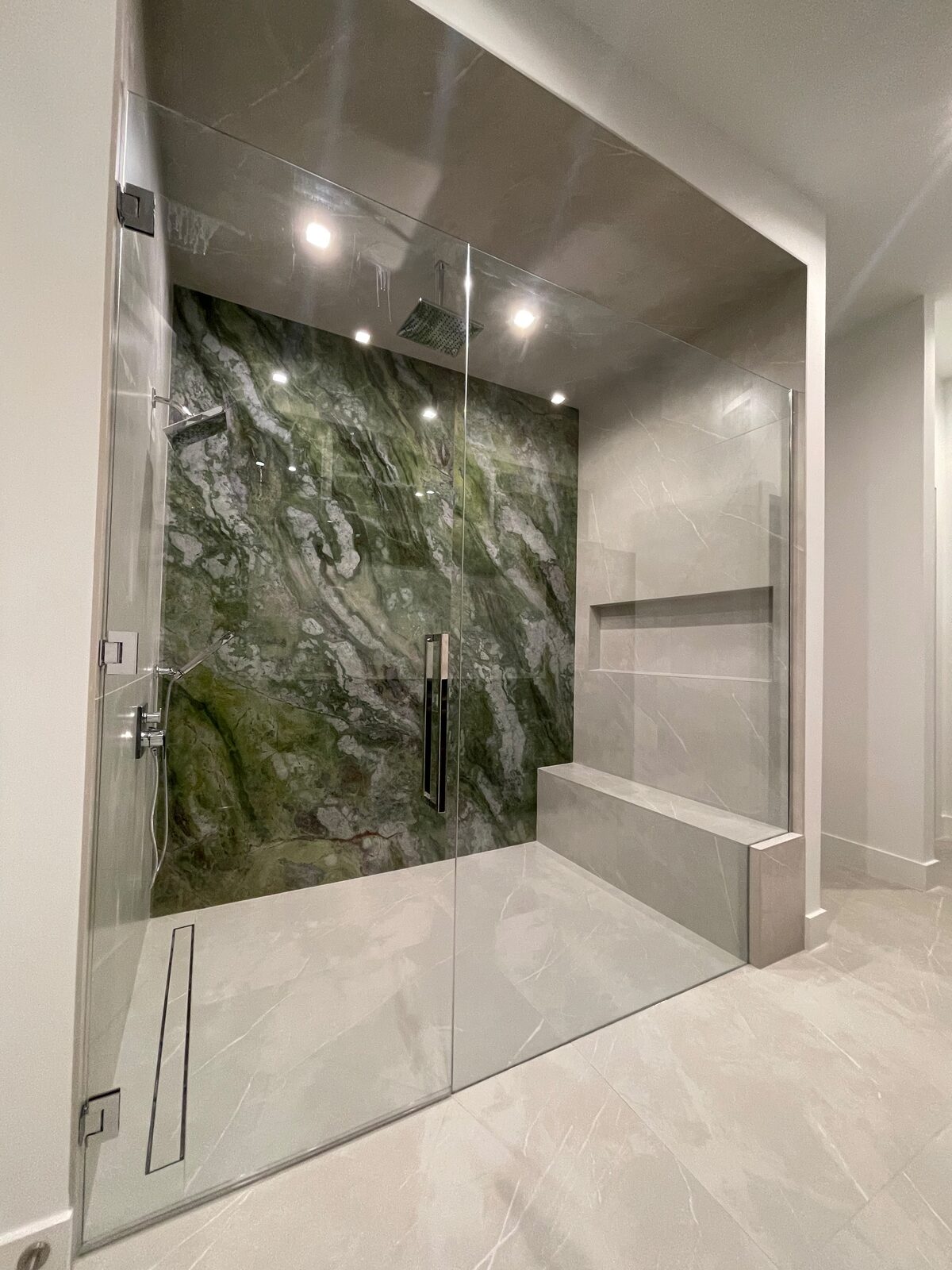 Steam shower with green marble