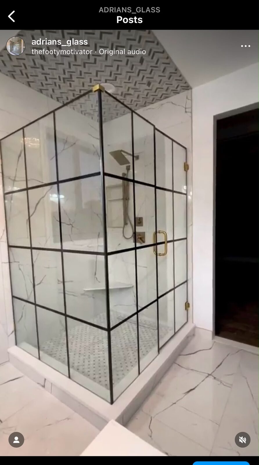 Frameless glass shower with industrial gold grid